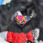 andie framed in a persons hands shaped like heart