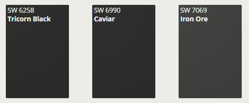 Paint swatches of Sherwin-Williams Tricorn Black, Caviar, and Iron Ore for accent wall inspiration