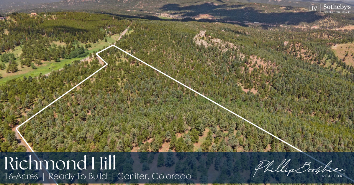 Richmond Hill 16-acre wooded lot in Conifer, Colorado, with a gated entrance and stunning mountain views.