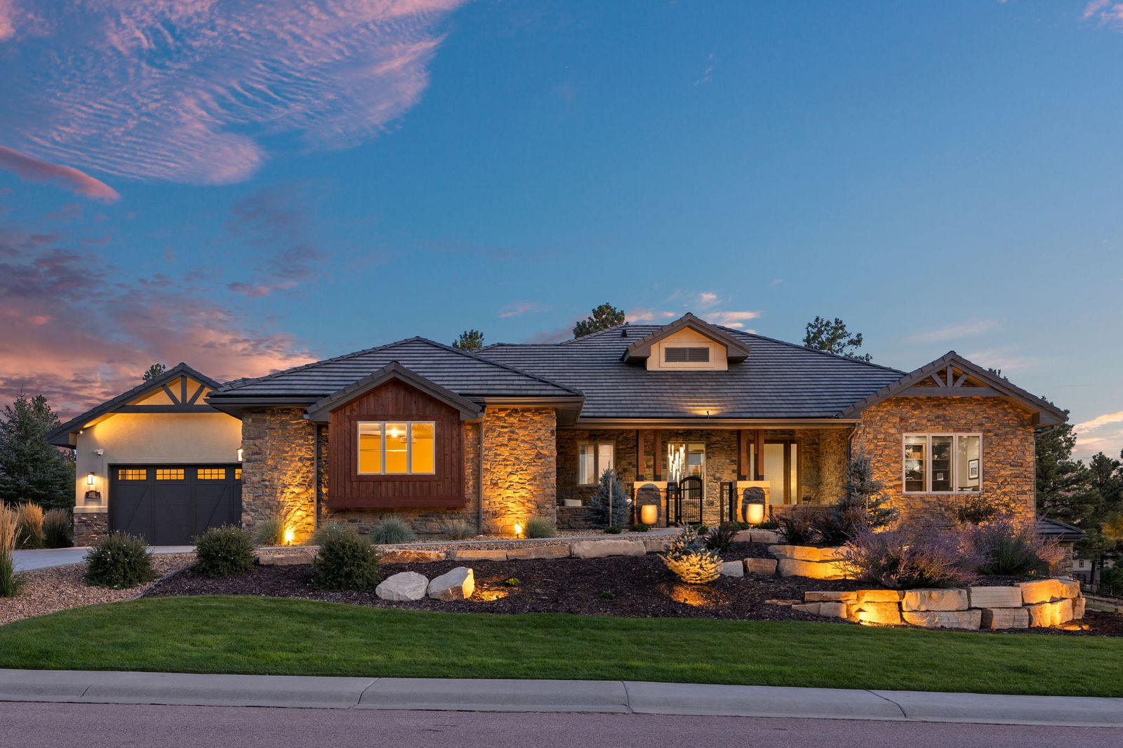 5612 Ponderosa Drive in The Timbers at The Pinery, Parker, Colorado, at dusk